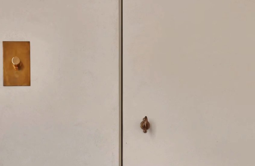 Closet with brass hardware