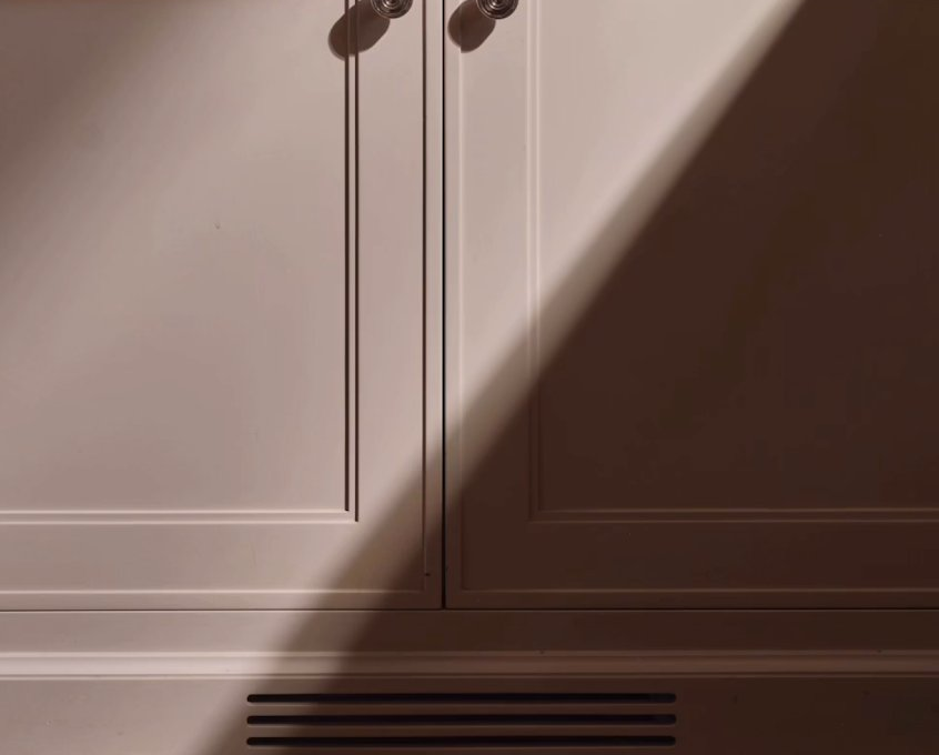 Cream cabinets with nickel hardware